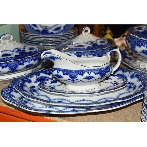 441 - A QUANTITY OF FLOW BLUE WAVERLEY PATTERN BY GRINDLEY DINNERWARE, comprising twelve dinner plates, tw... 