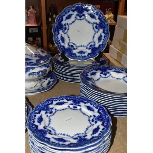 441 - A QUANTITY OF FLOW BLUE WAVERLEY PATTERN BY GRINDLEY DINNERWARE, comprising twelve dinner plates, tw... 