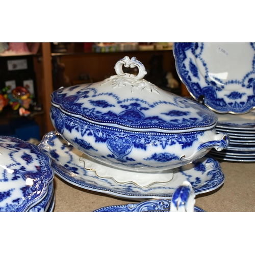 441 - A QUANTITY OF FLOW BLUE WAVERLEY PATTERN BY GRINDLEY DINNERWARE, comprising twelve dinner plates, tw... 