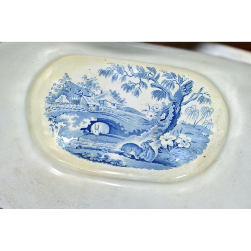 443 - A COLLECTION OF 19TH CENTURY BLUE AND WHITE STONEWARE, comprising a floral transfer printed oval ped... 