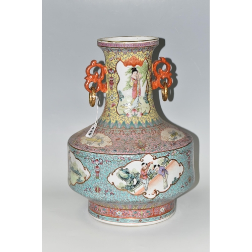 449 - A CHINESE TURQUOISE FAMILLE ROSE PORCELAIN VASE, decorated around the centre by four panels depictin... 