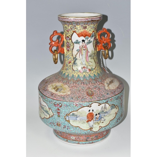 449 - A CHINESE TURQUOISE FAMILLE ROSE PORCELAIN VASE, decorated around the centre by four panels depictin... 