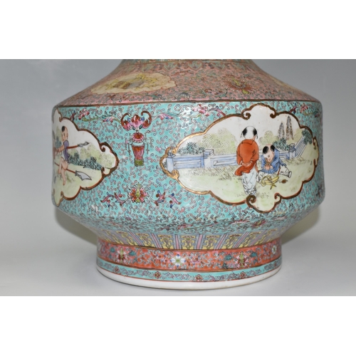 449 - A CHINESE TURQUOISE FAMILLE ROSE PORCELAIN VASE, decorated around the centre by four panels depictin... 