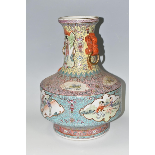 449 - A CHINESE TURQUOISE FAMILLE ROSE PORCELAIN VASE, decorated around the centre by four panels depictin... 