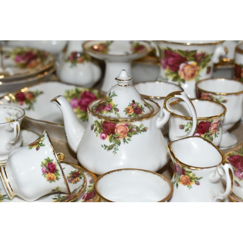 453 - A LARGE QUANTITY OF ROYAL ALBERT 'OLD COUNTRY ROSES' PATTERN TEA AND DINNERWARE, comprising three te... 