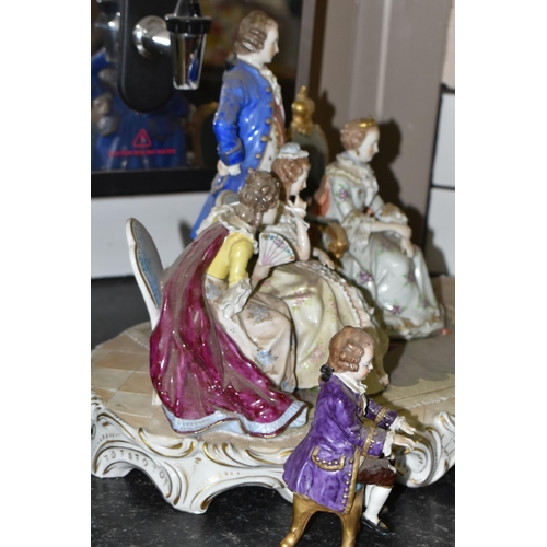 461 - A SITZENDORF PORCELAIN FIGURE GROUP, depicting the six year old Mozart playing piano for a group inc... 