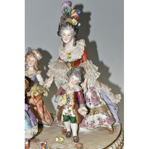 463 - A DRESDEN FIGURE GROUP, an early 20th century German porcelain figure group depicting a joyful famil... 