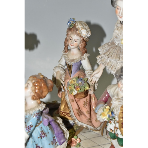 463 - A DRESDEN FIGURE GROUP, an early 20th century German porcelain figure group depicting a joyful famil... 