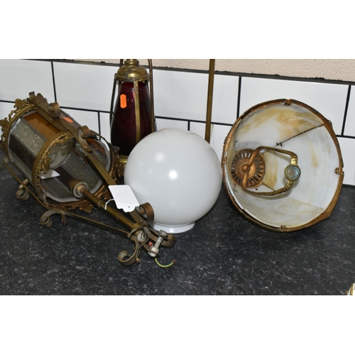 466 - A GROUP OF GLASS SHADES AND LAMPS, to include a white glass globe shaped shade, an electric brass ta... 