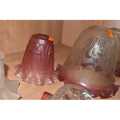 472 - A GROUP OF NINE GLASS ART DECO LAMP SHADES, comprising a pair of acid etched clear to cranberry shad... 