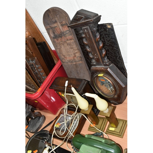 481 - A BOX AND LOOSE TREEN, TELEPHONE AND METAL WARES, to include various wooden carved panels, a brass c... 