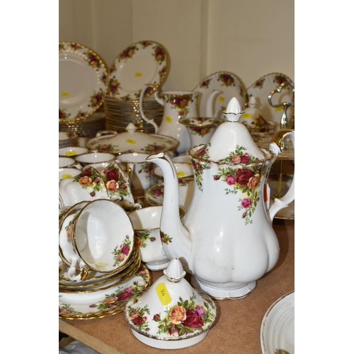 514 - A QUANTITY OF ROYAL ALBERT OLD COUNTRY ROSES TEA AND DINNER WARES ETC, comprising twelve dinner plat... 