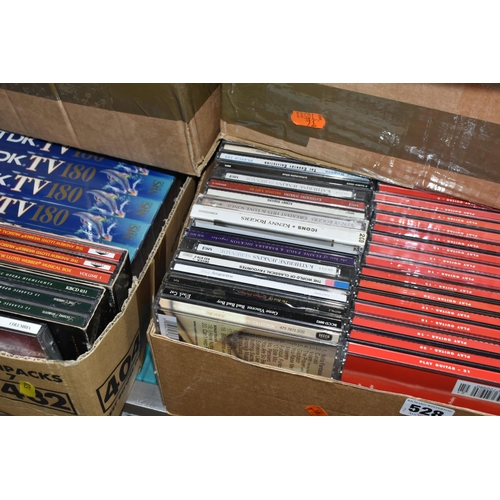 528 - SIX BOXES OF CDS AND VIDEOS, to include thirty new and unused TDK TV 180 VHS cassettes, a boxed set ... 