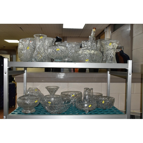 529 - A LARGE QUANTITY OF CUT CRYSTAL AND GLASSWARE, comprising fruit bowls, rose bowls, punch bowl, vases... 