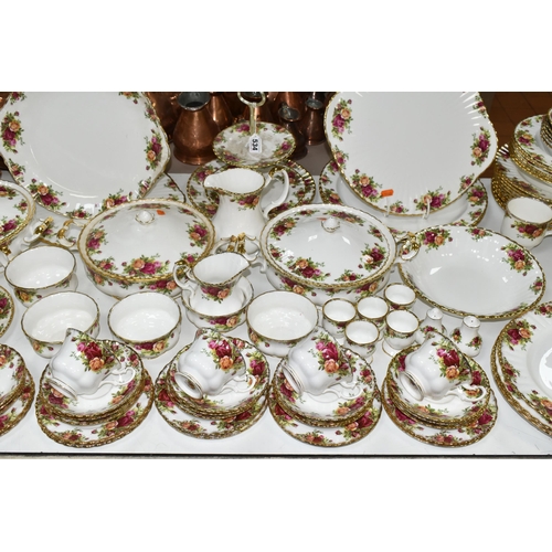 534 - A ONE HUNDRED AND TWENTY NINE PIECE ROYAL ALBERT 'OLD COUNTRY ROSES' DINNER SERVICE AND GIFT WARES, ... 