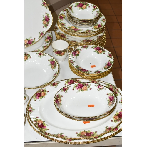 534 - A ONE HUNDRED AND TWENTY NINE PIECE ROYAL ALBERT 'OLD COUNTRY ROSES' DINNER SERVICE AND GIFT WARES, ... 