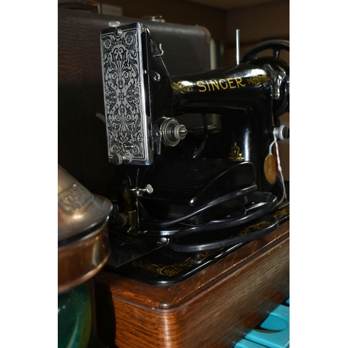 545 - A SINGER ELECTRIC SEWING MACHINE, Serial No.EB417318, not tested, appears in good condition, missing... 