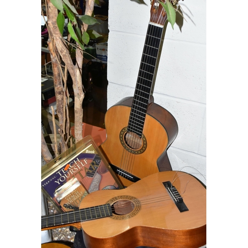 553 - THREE ACOUSTIC GUITARS, comprising a Hokada guitar model 3182 (some chips and knocks to edges, part ... 