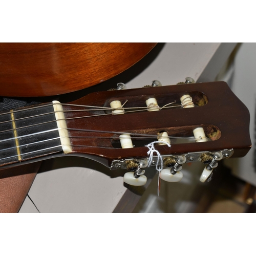 553 - THREE ACOUSTIC GUITARS, comprising a Hokada guitar model 3182 (some chips and knocks to edges, part ... 