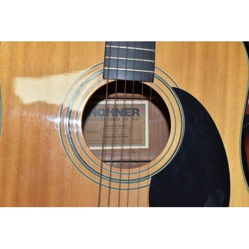 556 - A CASED HOHNER GUITAR, model no MW 400N, in a Stagg guitar case with 'The Complete Guitar Player: Bo... 