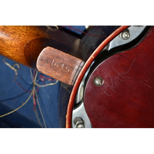 557 - A MANDOLIN AND BANJULELE BANJO, comprising mandolin with inlaid details and homemade shoulder strap ... 