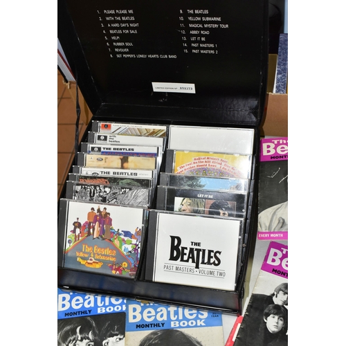 559 - A BOX OF 'THE BEATLES' BOOKS AND CDS, to include a boxed HMV The Beatles Complete Compact Disc Colle... 