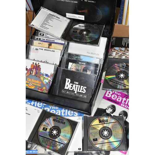 559 - A BOX OF 'THE BEATLES' BOOKS AND CDS, to include a boxed HMV The Beatles Complete Compact Disc Colle... 