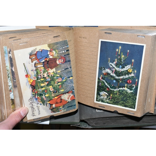 568 - TWO ALBUMS OF POSTCARDS containing approximately 405 miscellaneous examples, album one contains 104 ... 