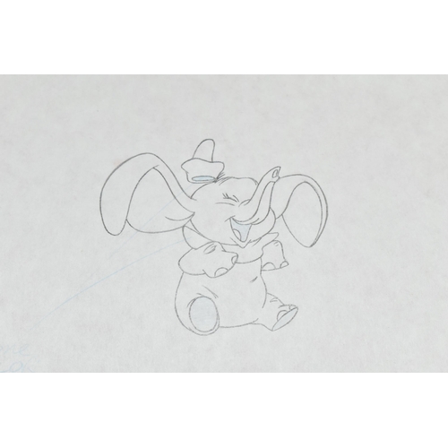 572 - A PENCIL DRAWING OF DISNEY'S DUMBO THE ELEPHANT, the sketch has blue shadow areas with text indicati... 