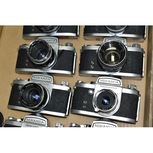 594 - A BOX OF TWELVE MIRANDA 35MM SLR CAMERA BODIES, together with eleven Miranda standard focal length l... 