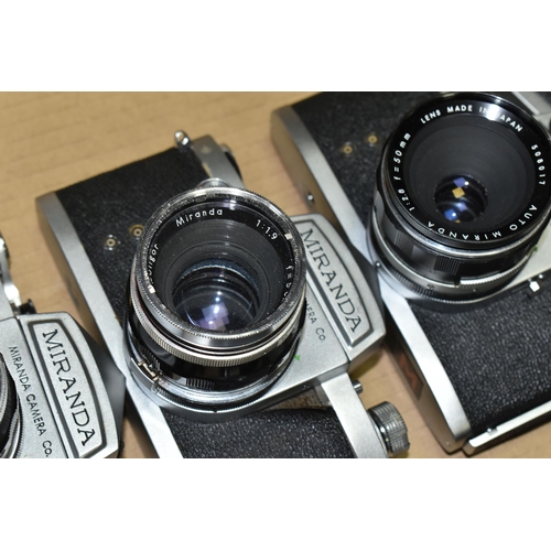 594 - A BOX OF TWELVE MIRANDA 35MM SLR CAMERA BODIES, together with eleven Miranda standard focal length l... 