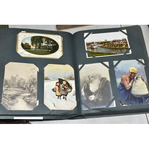 597 - TWO ALBUMS OF POSTCARDS containing approximately 391 miscellaneous examples from the early 20th cent... 