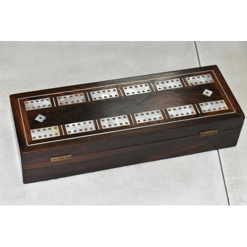 598 - A VICTORIAN ROSEWOOD CRIBBAGE BOX, mother of pearl inset to the playing surface, some wear to the in... 