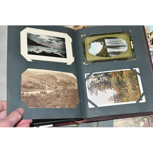 599 - TWO ALBUMS OF POSTCARDS containing approximately 407 miscellaneous examples (including large cards a... 