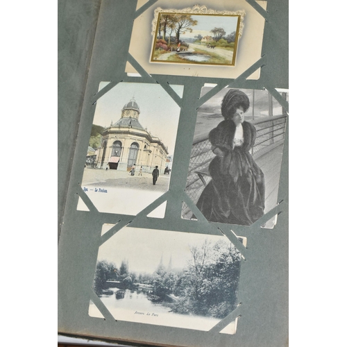 599 - TWO ALBUMS OF POSTCARDS containing approximately 407 miscellaneous examples (including large cards a... 