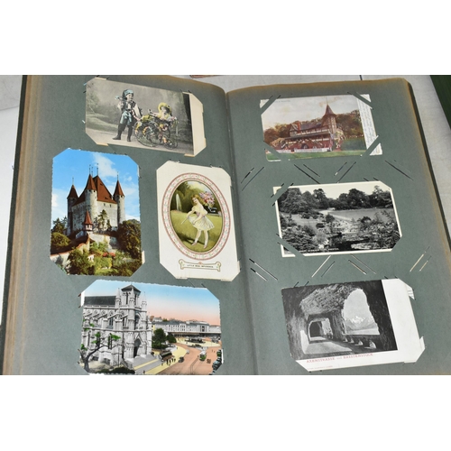 599 - TWO ALBUMS OF POSTCARDS containing approximately 407 miscellaneous examples (including large cards a... 