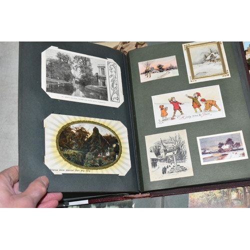 599 - TWO ALBUMS OF POSTCARDS containing approximately 407 miscellaneous examples (including large cards a... 