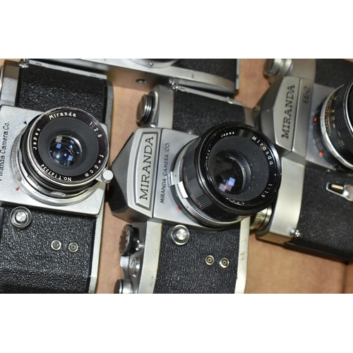 601 - SEVEN VINTAGE MIRANDA CAMERAS AND LENSES, comprising a ST body fitted with a 5cm f2.8 lens, an FV-T ... 