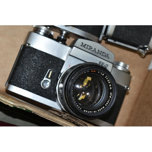 601 - SEVEN VINTAGE MIRANDA CAMERAS AND LENSES, comprising a ST body fitted with a 5cm f2.8 lens, an FV-T ... 