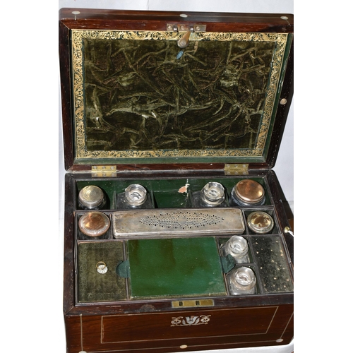 605 - A VICTORIAN MOTHER OF PEARL INLAY VANITY AND JEWELLERY BOX, the fitted interior with silver plate mo... 