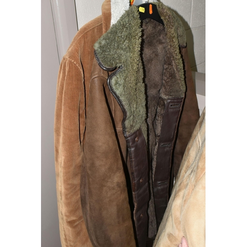 578 - A LARGE QUANTITY OF VINTAGE GENTLEMEN'S OVERCOATS AND JACKETS, to include a tan coloured 1970's leat... 