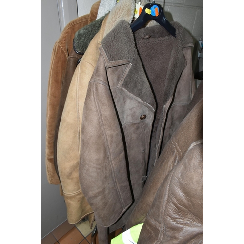 578 - A LARGE QUANTITY OF VINTAGE GENTLEMEN'S OVERCOATS AND JACKETS, to include a tan coloured 1970's leat... 