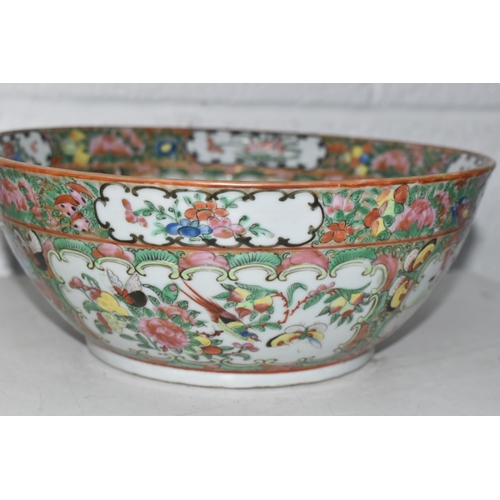 648 - A CANTON FAMILLE ROSE BOWL AND A JAPANESE GINGER JAR, bowl diameter 24.5cm, the ginger jar has an in... 