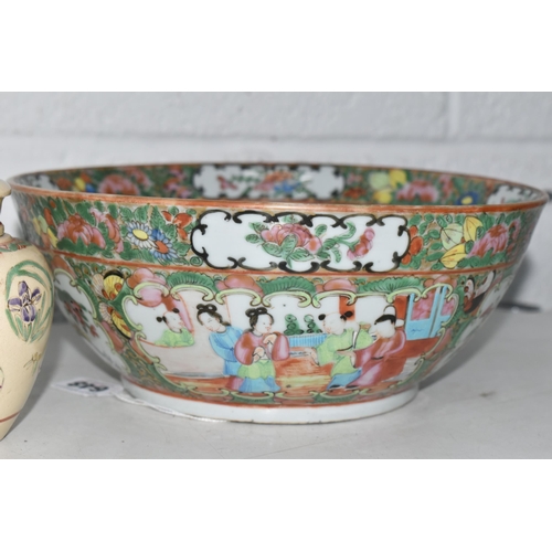 648 - A CANTON FAMILLE ROSE BOWL AND A JAPANESE GINGER JAR, bowl diameter 24.5cm, the ginger jar has an in... 