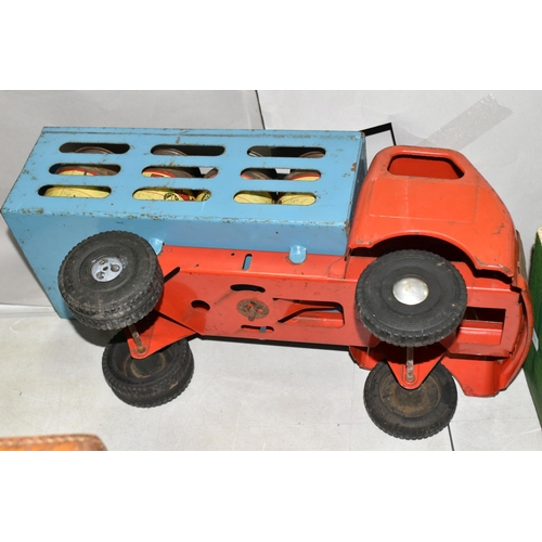 609 - A TRI-ANG DIESEL SERIES PRESSED STEEL MILK TRUCK, No.6057, red cab and chassis, blue body, black rub... 