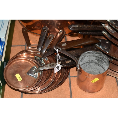 613 - A LARGE QUANTITY OF COPPER SAUCEPANS, POTS AND LIDS, comprising a large  pan, diameter 33cm, a set o... 