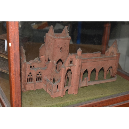 632 - A MODEL OF THE SWEET HEART ABBEY, New Abbey Dumfries in a wooden and glass glazed case, height 27cm ... 