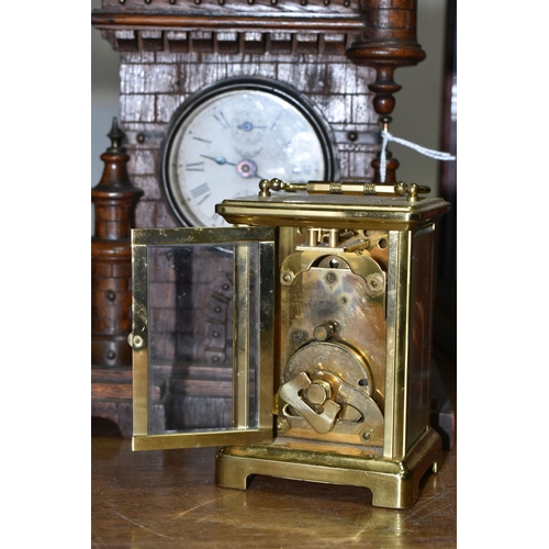 634 - TWO VINTAGE CLOCKS, comprising a brass Bayard 8 day carriage clock, in need of some attention and an... 