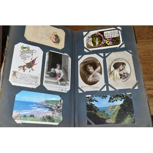 635 - TWO ALBUMS OF POSTCARDS containing approximately 490 mainly sentimental greeting type examples from ... 