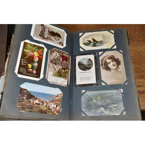 635 - TWO ALBUMS OF POSTCARDS containing approximately 490 mainly sentimental greeting type examples from ... 